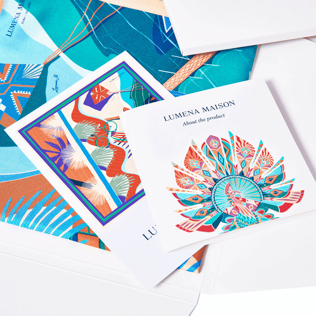 Signature silk packaging for elegant scarf presentation | Lumena Maison